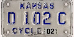 Kansas 2002 motorcycle dealer license plate #D-102-C