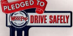 Woco Pep license plate topper